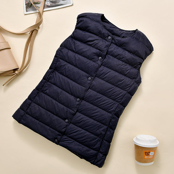 Women's sleeveless quilted thermal vest with round neck and snap button placket Amarae