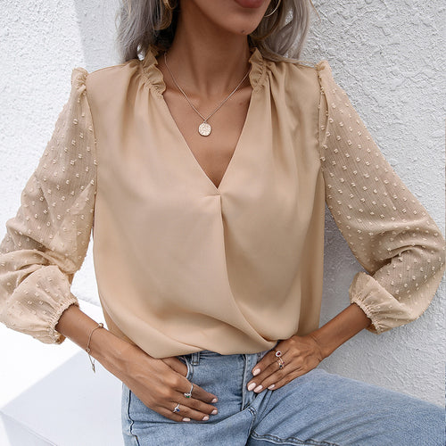 Elegant women's blouse with structured sleeve detail Amarae