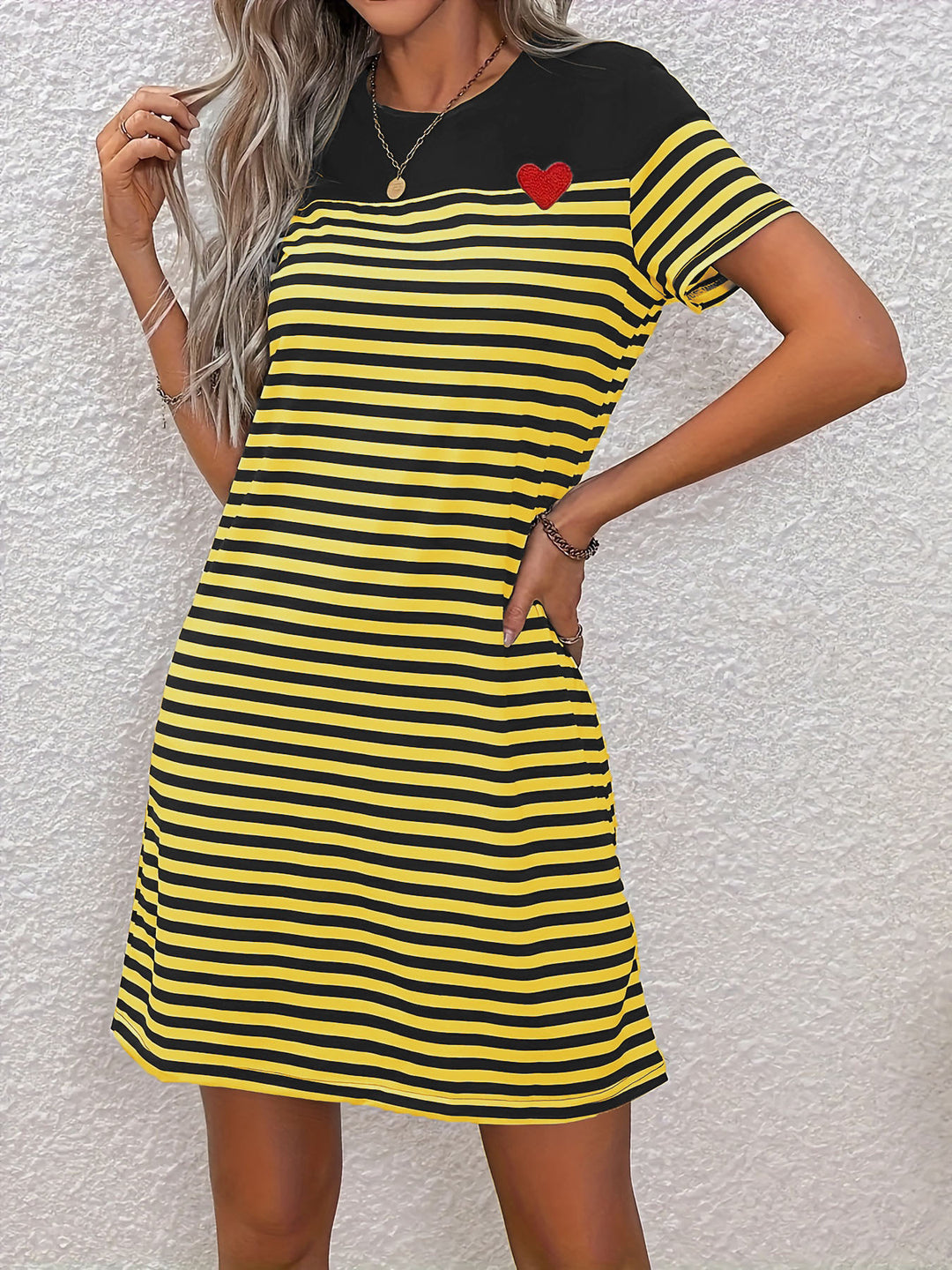 Short-sleeve dress for women with a striped design and a red heart appliqué Lune London
