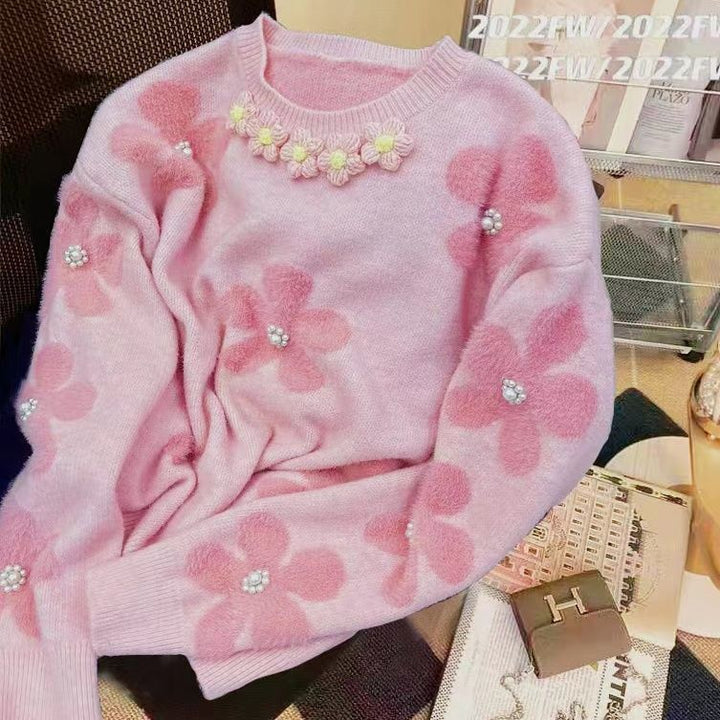 Pull en tricot pour femmes avec design floral et embellissements en perles Chic & Stil