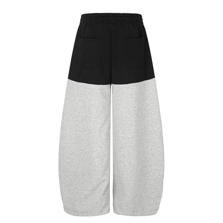 Women's Oversize Two-Tone Palazzo Sweatpants made of French Terry with logo studs, drawstring and adjustable hem.