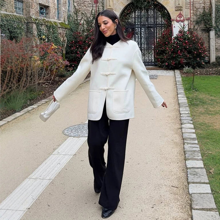 Women's short coat with Chinese toggle closures, oversized sleeves, and patch pockets Amarae