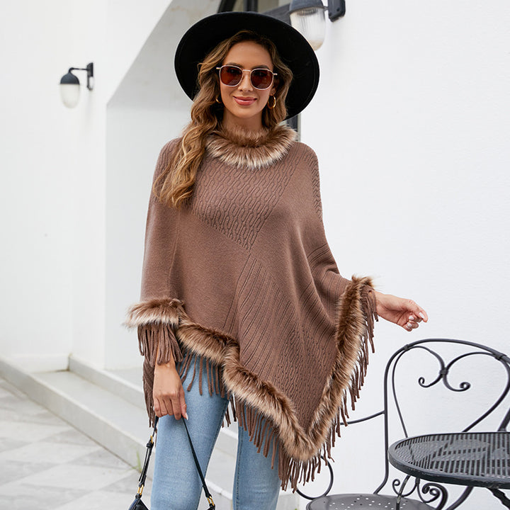 Ladies elegant poncho with luxurious faux fur collar and decadent fringes Lune London