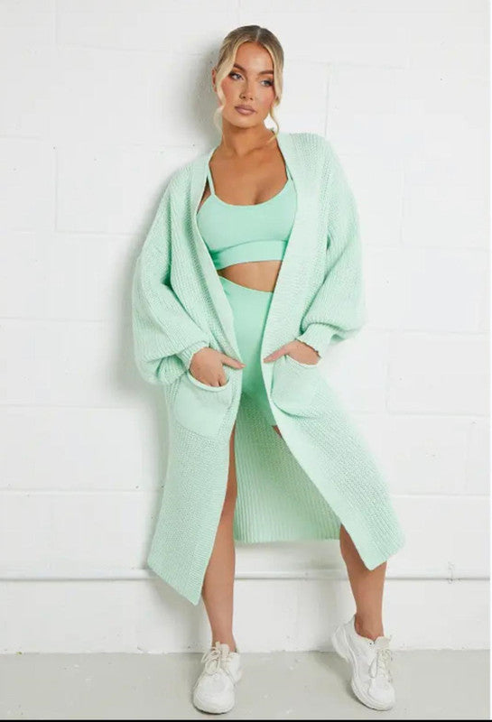 Ladies long cardigan with a chunky knit structure and practical pockets Lune London
