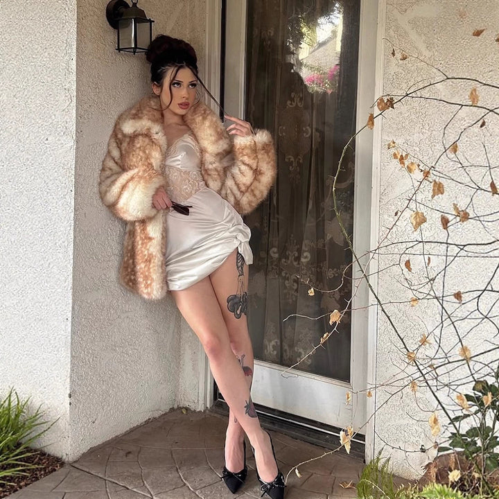Women Mid-length plush faux fur coat with voluminous shawl collar and boxy silhouette Amarae