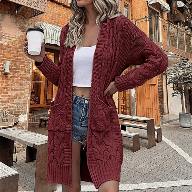 Knitted coat for women with an elegant textured pattern and practical pockets Lune London