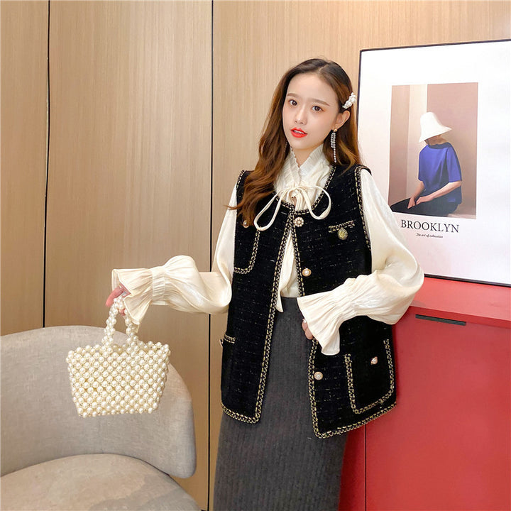 Gilet pour femmes avec des boutons élégants et un design texturé Chic & Stil