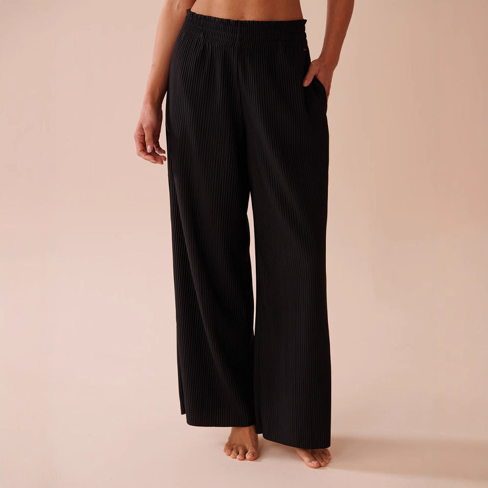 Casual pleated pants for women with elastic waistband and side pockets Lune London