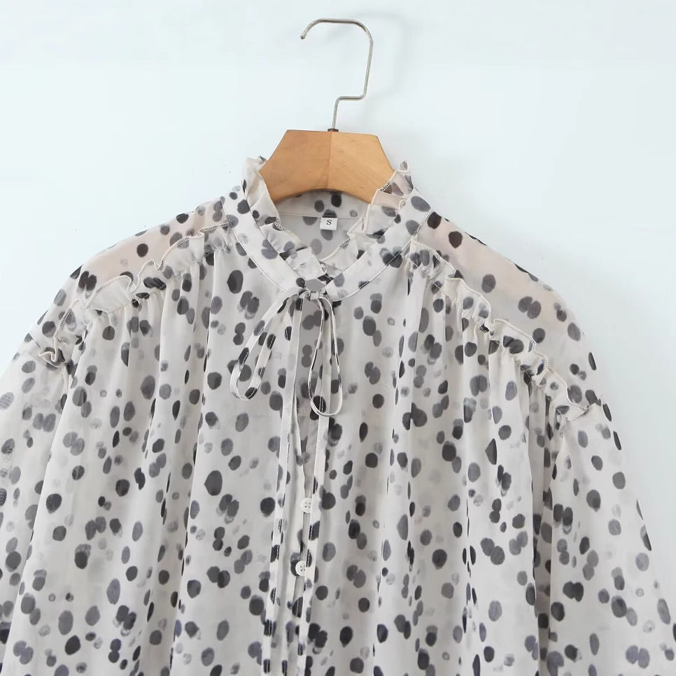 Blouse élégante pour femmes avec col demi et manches aérées Chic & Stil
