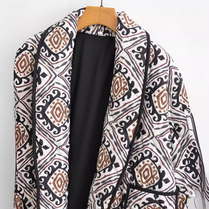 Veste matelassée élégante pour femmes avec ceinture à la taille et manches larges Chic & Stil