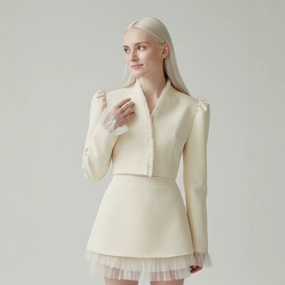 Ladies short blazer with tailored cropped silhouette, gathered shoulders and delicate tulle cuffs Amarae
