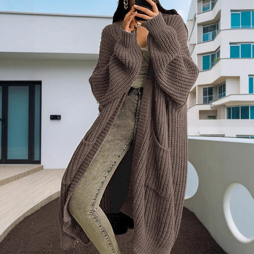 Thick knit coat for women with casual pockets and open design Amarael