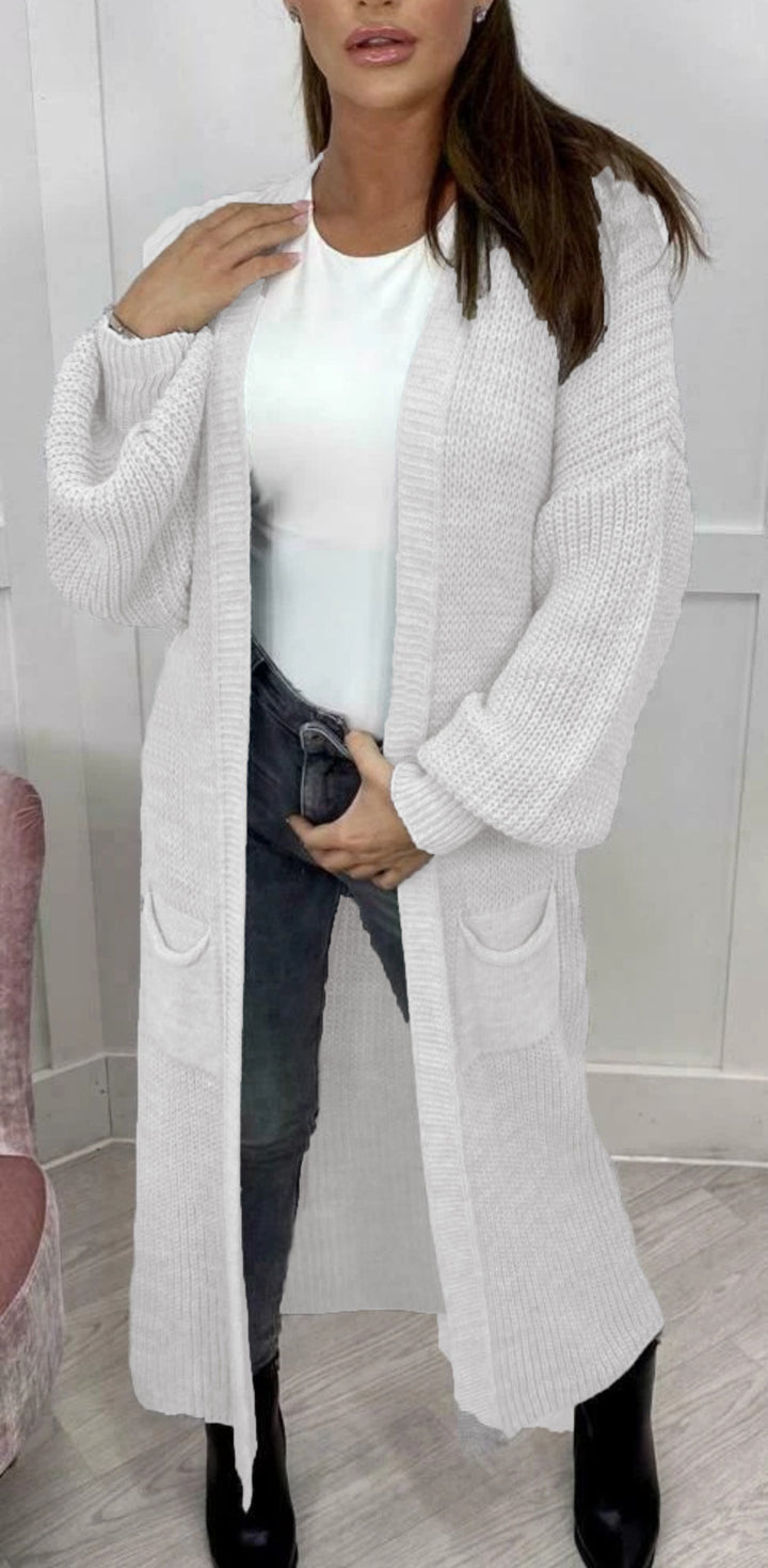 Ladies' knitted coat with deep pockets and modern details Lune London