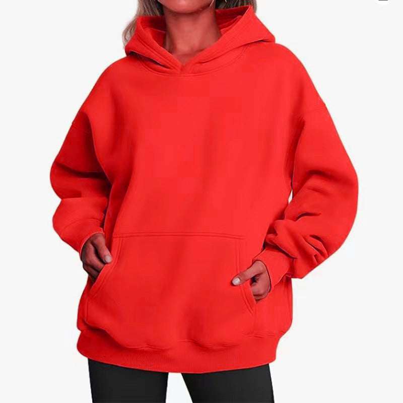 Women's oversized hoodie with practical kangaroo pockets and soft inner lining Chic & Stil