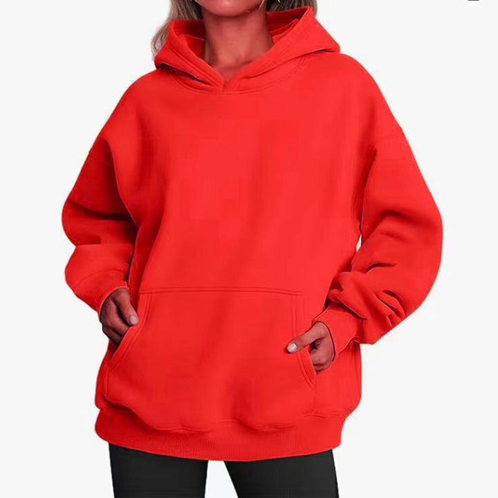 Women's oversized hoodie with practical kangaroo pockets and soft inner lining Chic & Stil