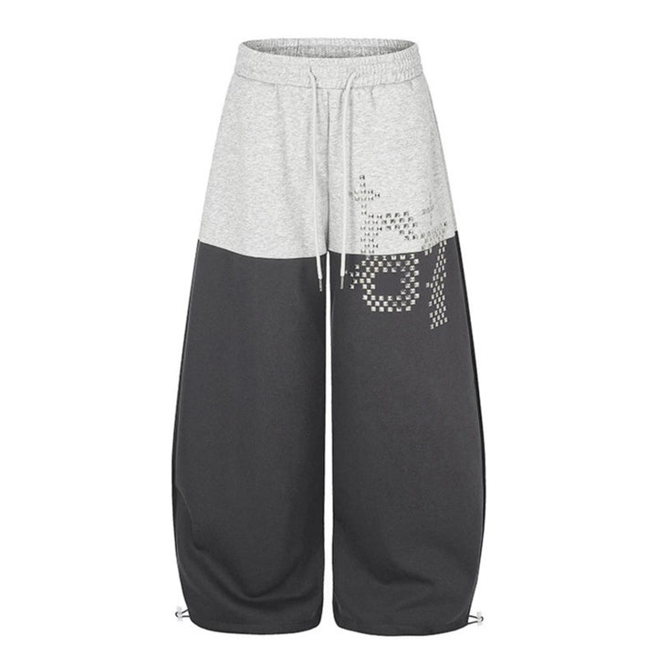 Women's Oversize Two-Tone Palazzo Sweatpants made of French Terry with logo studs, drawstring and adjustable hem.