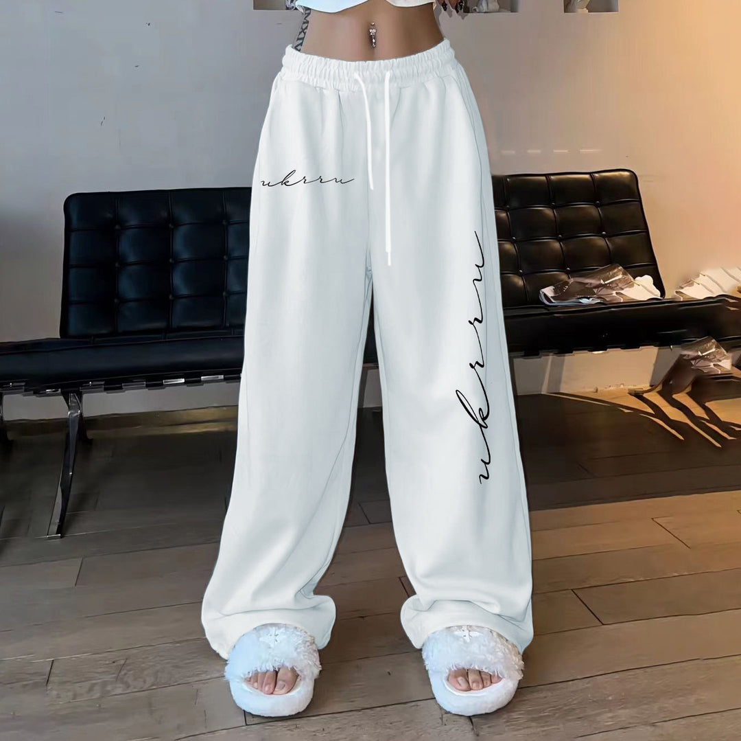 Women comfortable leisure trousers with elastic waistband and side print Chic & Stil