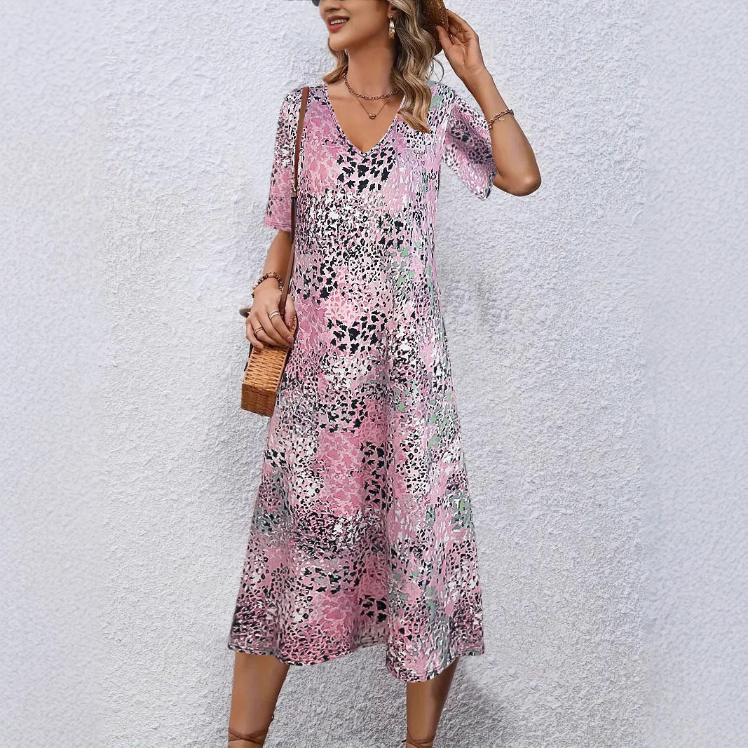 Fluid midi dress for women with eye-catching abstract patterns Lune London
