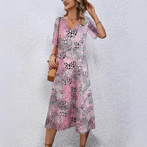 Fluid midi dress for women with eye-catching abstract patterns Amarae