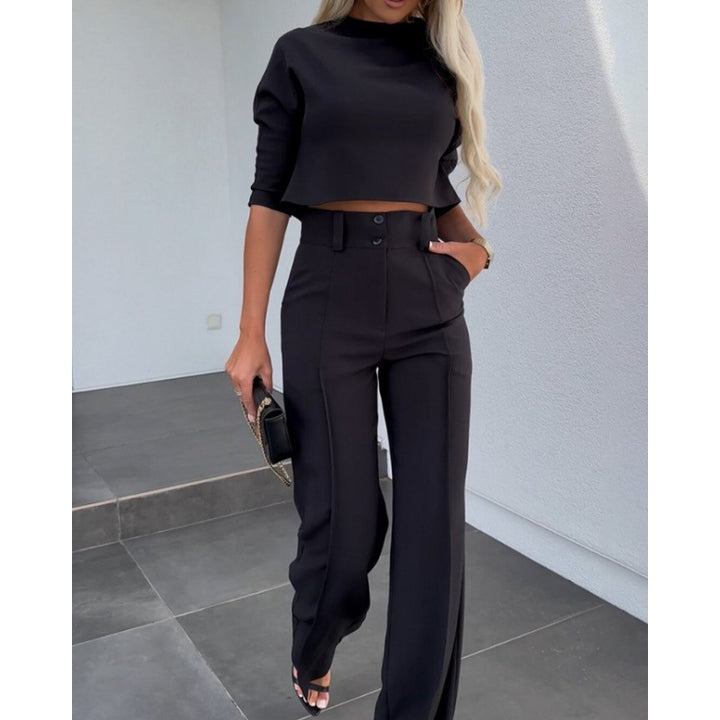 Woman trendy cropped top with elegant palazzo pants Lune London