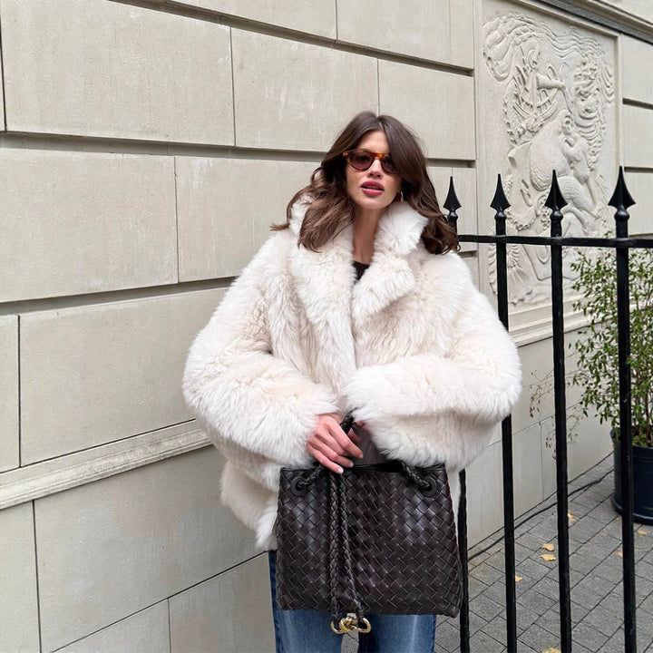 Women's short coat made of voluminous faux fur with a rounded shawl collar and boxy silhouette Amarae