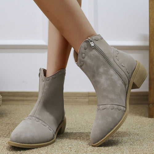 Elegant ankle boots for women with trendy decorative stitching and a practical zipper Amarae