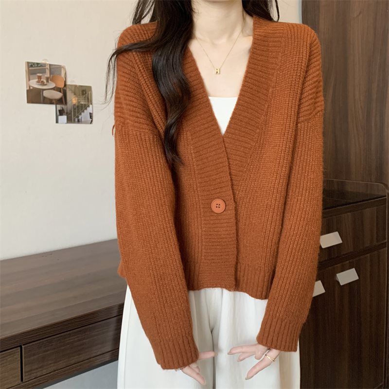Cardigan tendance femme avec décolleté en V profond et fermeture à boutons Chic & Stil