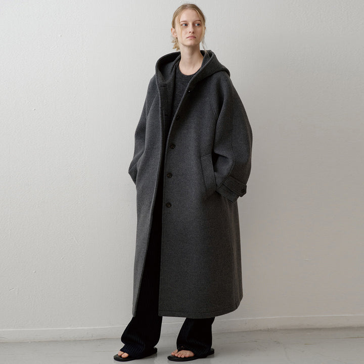 Manteau surdimensionné élégant pour femmes avec capuche et poches pratiques Chic & Stil