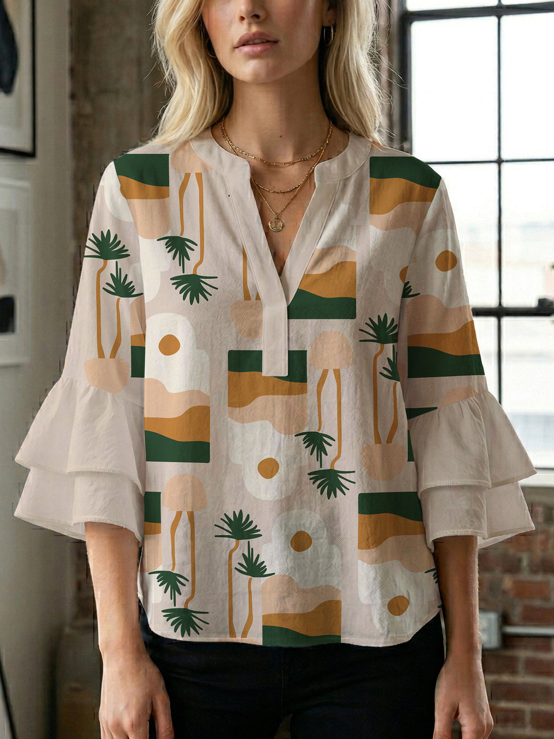 Women's blouse with ruffle details and eye-catching animal print Lune London