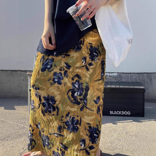 Maxi skirt for women with elegant pleats and floral appliqués Amarae