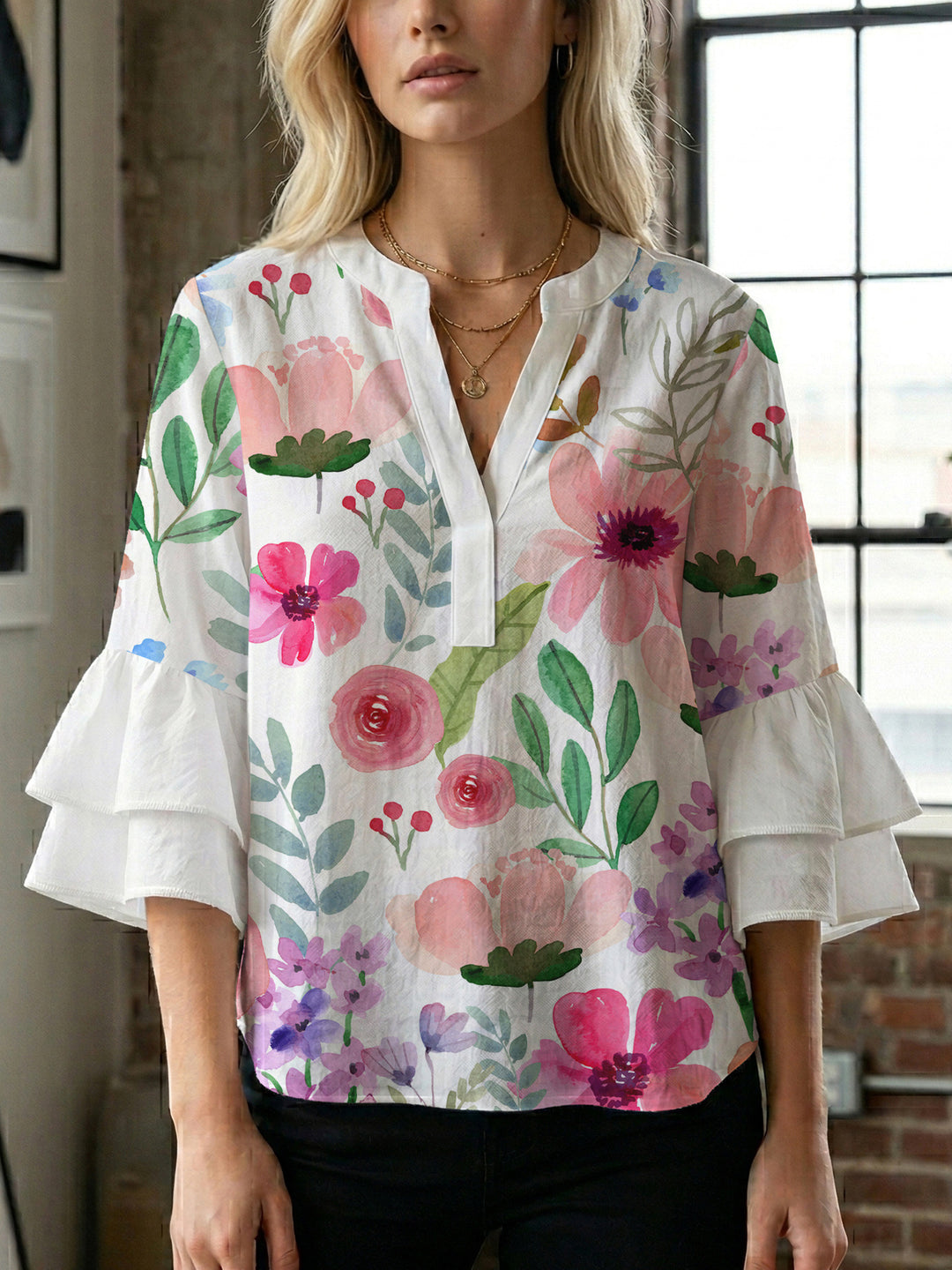 Ladies elegant top with voluminous ruffle hems and floral design Lune London