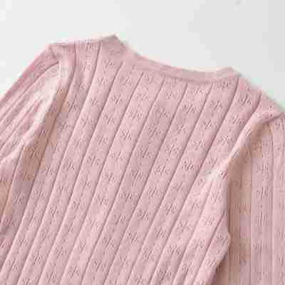 Women's fine knit long sleeve with button placket and textured knit Amarae