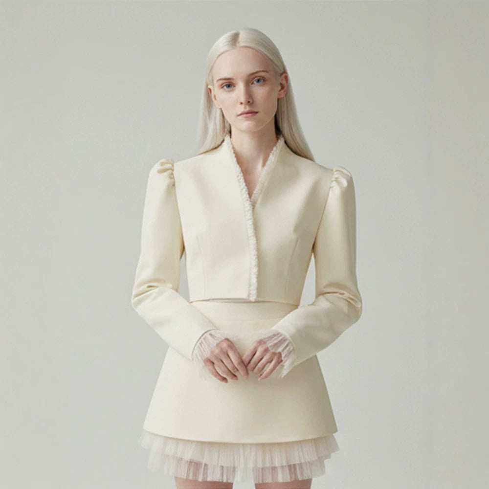 Ladies short blazer with tailored cropped silhouette, gathered shoulders and delicate tulle cuffs Amarae