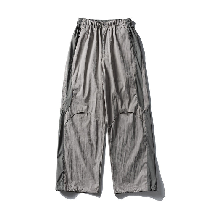 Men's loose technical nylon cargo pants with elastic waistband and panel details Amarae