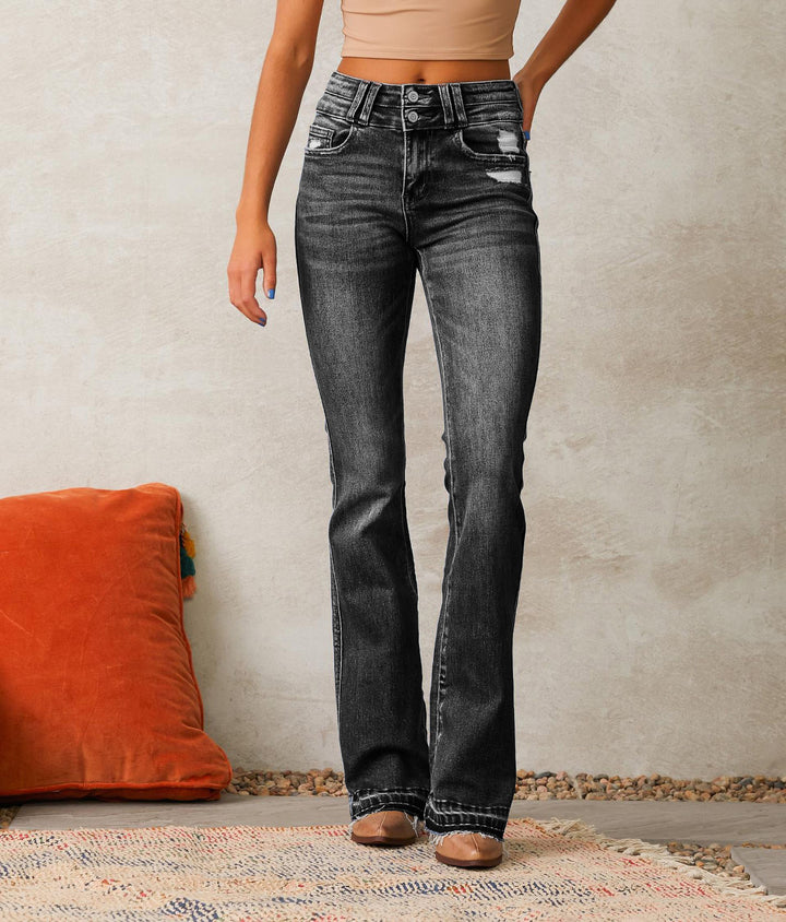 High-waisted flared jeans for women with trendy ripped details Chic & Stil