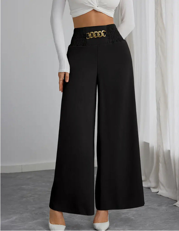 Wide palazzo trousers for women with elastic waistband and decorative belt Lune London