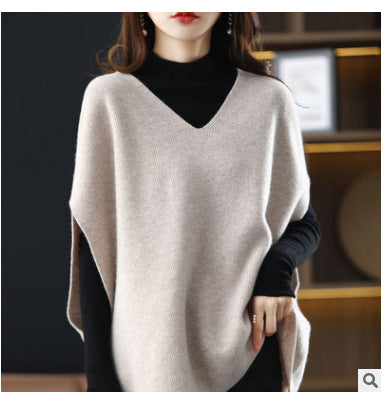 Knitted poncho for women with V-neck and chic elegant silhouette