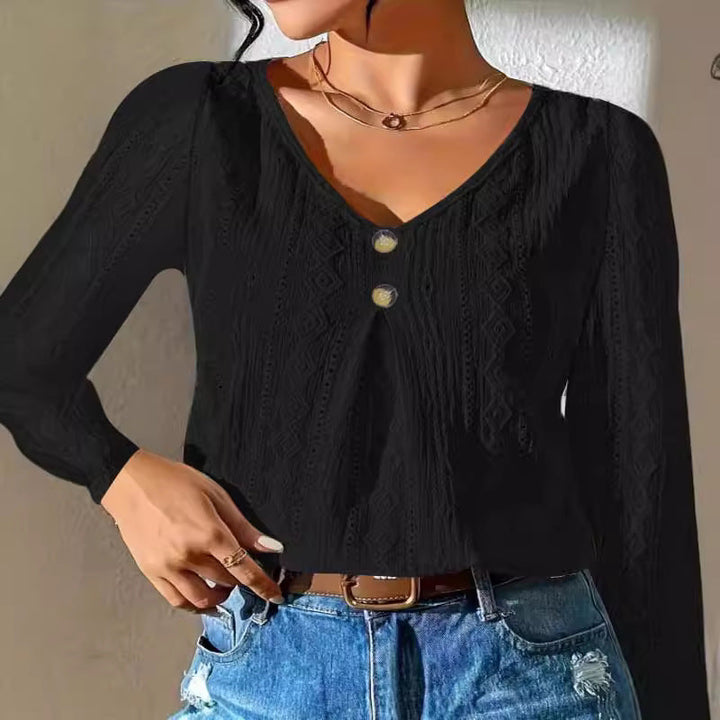 Women's blouse with decorative buttons and textured fabric Amarae