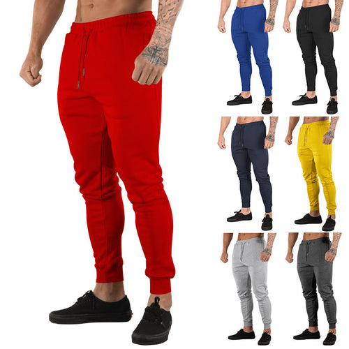Men's training pants with elastic waistband and handy zipper Amarae