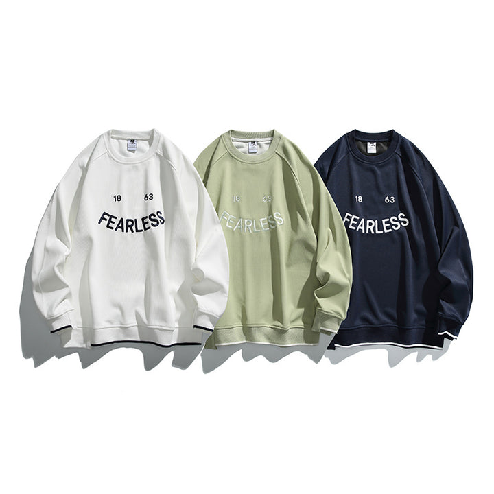 Unisex Oversize Sweatshirt with raglan sleeves and distinctive FEARLESS front print Amarae