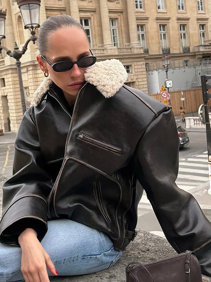 Women Short Cut Leather Imitation Bomber Jacket with Voluminous Teddy Shawl Collar and Distinctive Decorative Seams Amarae