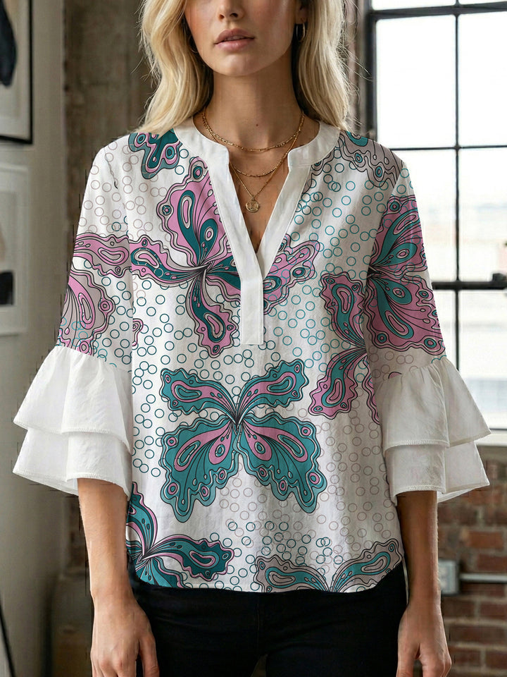 Women's blouse with voluminous ruffle sleeves and creative floral design Lune London