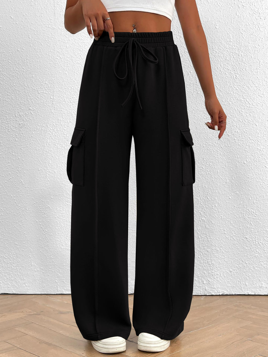 Wide cargo pants for women with elastic waist and practical pockets Lune London