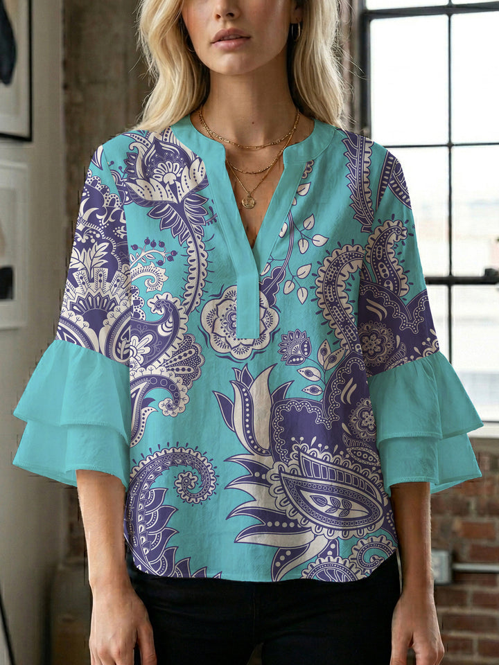 Ladies elegant top with voluminous ruffle hems and floral design Lune London