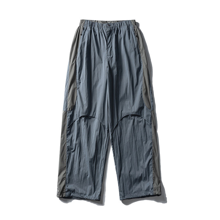 Men's loose technical nylon cargo pants with elastic waistband and panel details Amarae