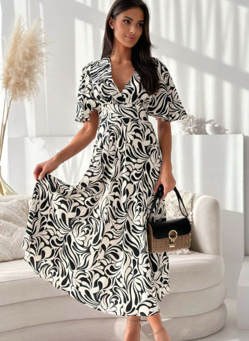 Lune London Women's maxi dress with floral print and butterfly sleeves