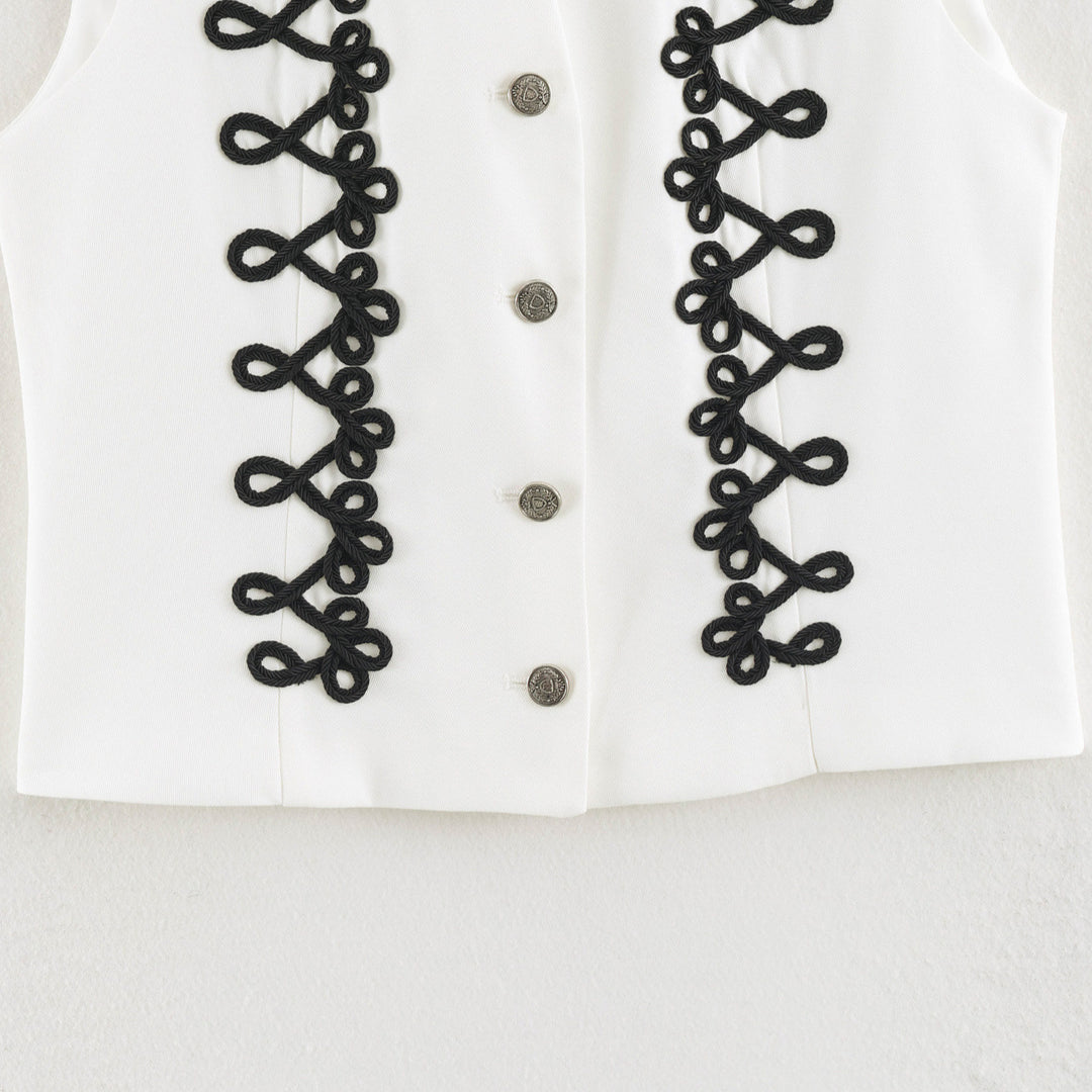 Women's sleeveless vest in uniform style with decorative frog closures and stand-up collar Amarae