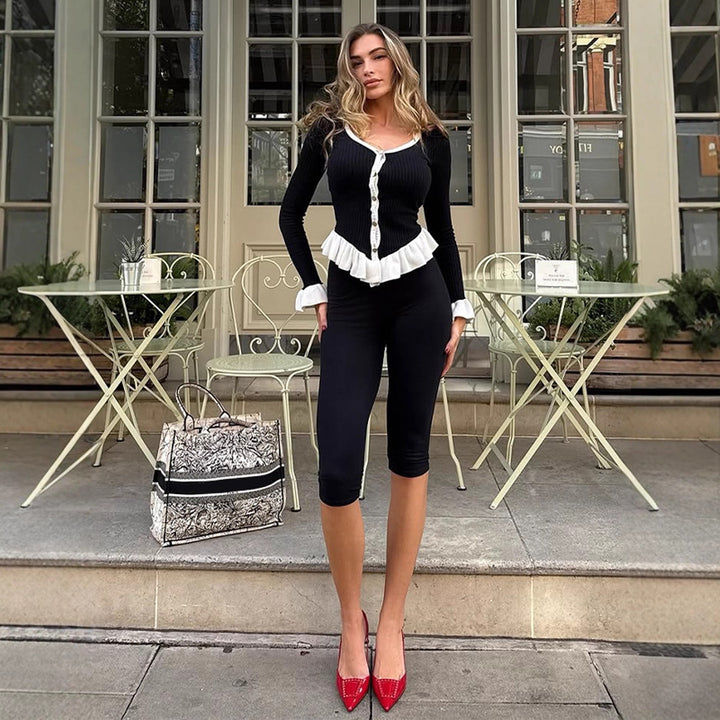 Ladies Ribbed Cardigan with Flounce Hem, Decorative Buttons and Ruffled Cuffs Amarae