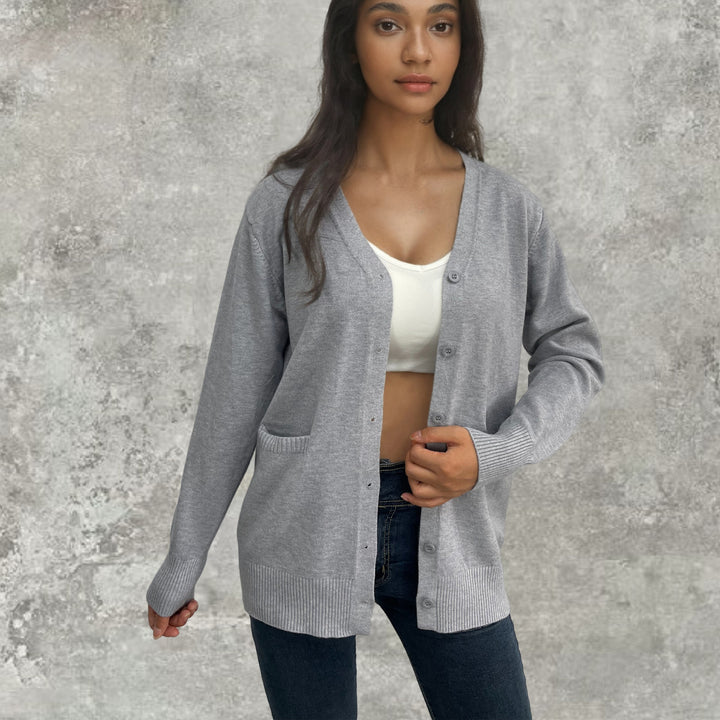 Cardigan pour femmes avec motif à côtes fines et poches pratiques Chic & Stil