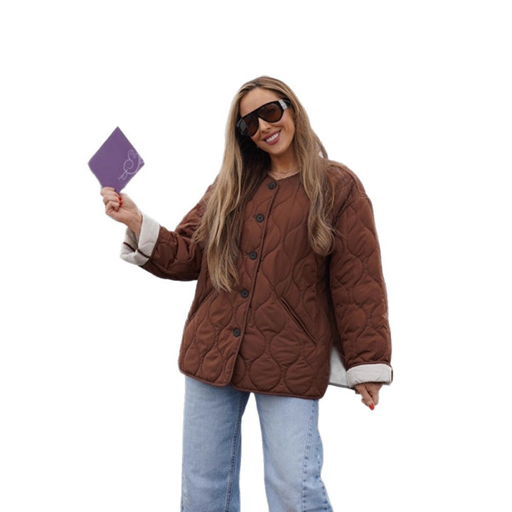 Women's quilted transitional jacket with round quilting, boxy silhouette and press stud placket Amarae
